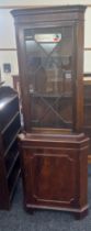 Mahogany corner cabinet measures approx 71 inches tall