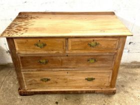 Two over two stripped mahogany chest measures approx 29 inches tall by 43 inches wide and 20.5