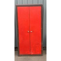 two door red metal cupboard