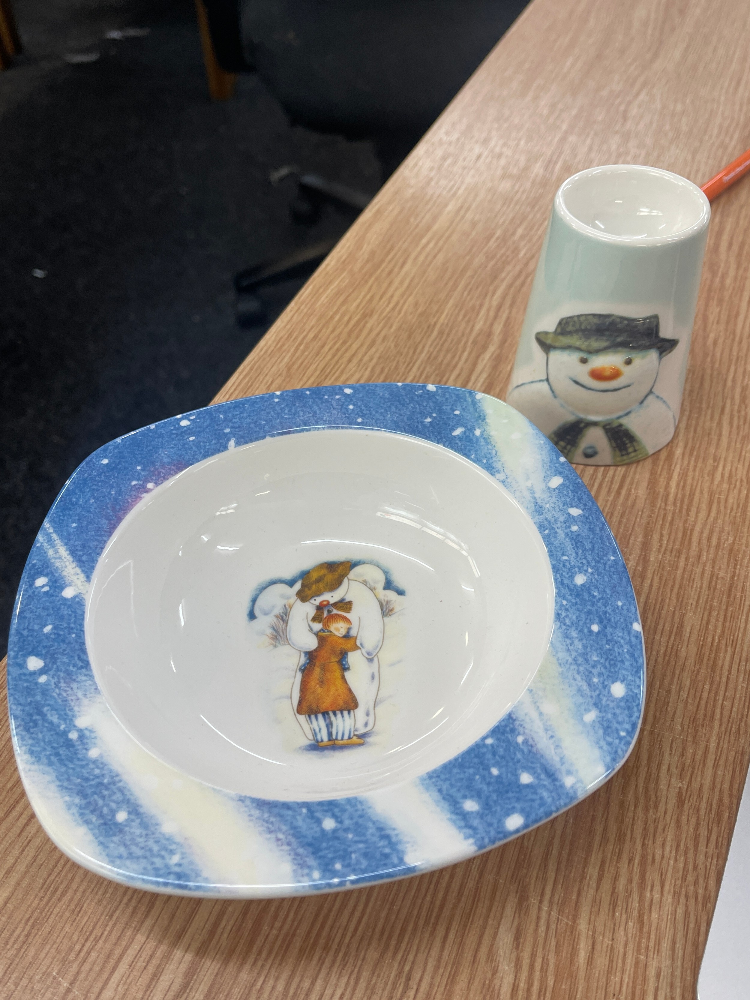 The Snow man pottery, bowl and egg cup