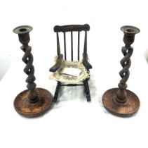 Pair of barley twist candle sticks and a miniature rocking chair