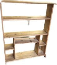 Pine book case 48 inches tall 59 inches wide 9 inches depth