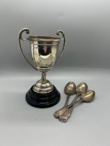 Hallmarked silver trophy with wooden base, 3 silver tea spoons, approximate total silver weight