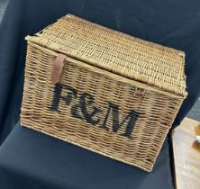 Large wicker basket measures approx 16 inches tall by 23 inches wide