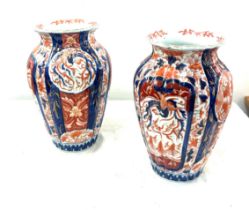 Pair of oriental vases, height 11 inches, a/f