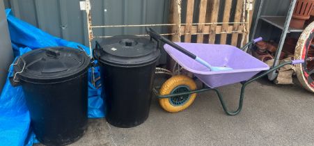 Horse feed bins, fort wheel barrow and a plastic shovel