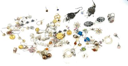 Large selection of assorted costume earrings