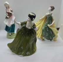 Three vintage Royal Doulton figures ' Lizzie' HN2749, ' Alexandra' H.N.2398 and ' Simone' H.N.2378