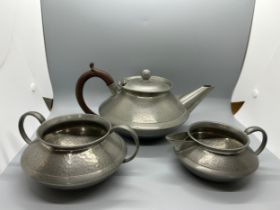 Matching deco style pewter teapot, sugar bowl and jug