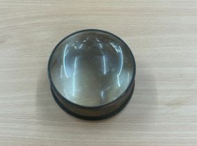 Large brass magnifying glass lens measures approx 2.5 inches tall by 4 inches diameter