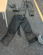 Selection of motor bike shoes and trousers to include Ashman