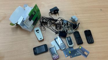 Selection of vintage phones and chargers