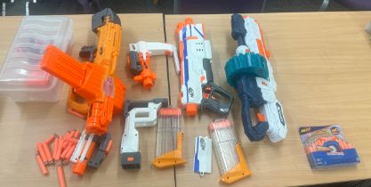 Large selection of assorted Nerf guns and accessories