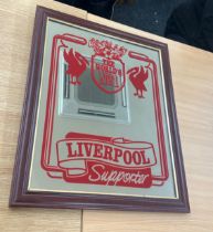 Framed Liverpool football mirror measures approx 23 inches tall by 19 wide