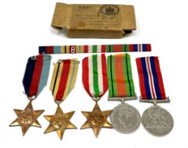 ww2 North Africa 8th Army and Italy star medal group and box named to mr s ford back named o.i/c