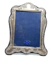 large vintage silver picture frame measures approx 27cm by 20cm