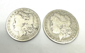 2 silver morgan dollars 1897 & 1884