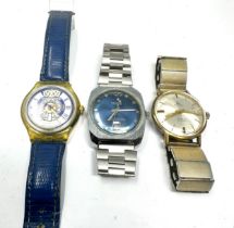 selection of vintage gents wrist watches inc swatch cronel & elco the watches are ticking