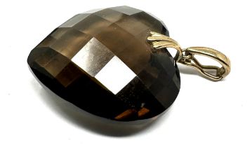 9ct gold bail faceted smoky quartz pendant measures approx 3.6cm drop by 2.4cm wide weight 8.7g