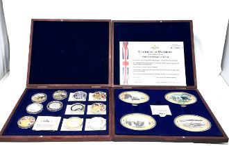 2 Boxed Collection of Windsor Mint d-day & defining moments Coins & plaques with c.o.a and
