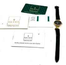 Ladies Gucci black dial wristwatch the watch is not ticking