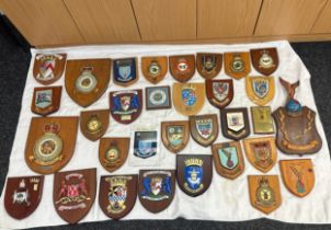 Large quantity of vintage RAF and local authority shields and plaques with squadron insignia and