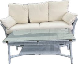 Lloyd loom sofa and coffee table, sofa measures approximately 68 inches by 35 inches depth 36 inches