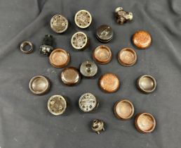 10 Bakelite castors and 9 bakelite light switches and 3 bakelite light fittings