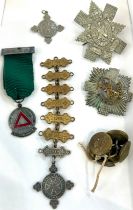 Selection of military and ambulance services badges etc