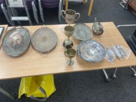 Large selection of silver plated items includes trophies, tea pot, bowls etc