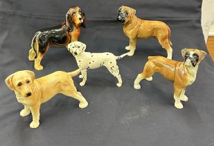 Large selection of assorted dog figures includes Cooper craft etc