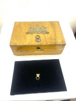 Brass bound coin box measures approximately 5 inches tall 15 inches wide 11 inches depth