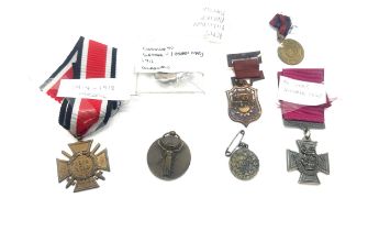 Selection of replica medals includes Victorian cross, WW1 medals etc