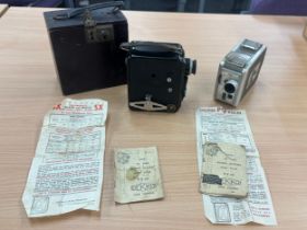 Two vintage cameras both with original paper work one ' Kodak Brownie 8mm movie camera II' and a '