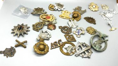 Selection of vintage cap badges, to include military and police pieces