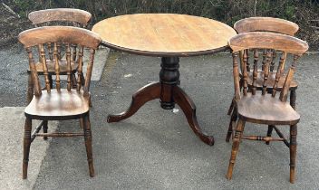 Dark stained Pine round pedestool table and 4 elm chairs. Table diameter 44 inches, table height