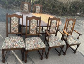 Old charm extending table, 1 leaf and 6 chairs to include to 2 carvers, table measurements: length