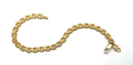 22ct gold ladies bracelet, with a repaired clasp which is 9ct gold, overall weight 12.4g, length