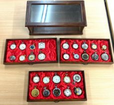 Wooden showcase containing 28 pocket watches, all untested
