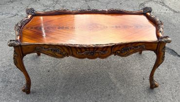 Mahogany carved coffee table, approximate measurements: Height 17 inches, length 37 inches, Depth