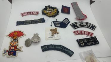 Selection of assorted cloth badges