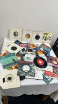 Selection of 45s includes Squeeze, David bowie etc