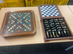 Scrabble board game and a chess set