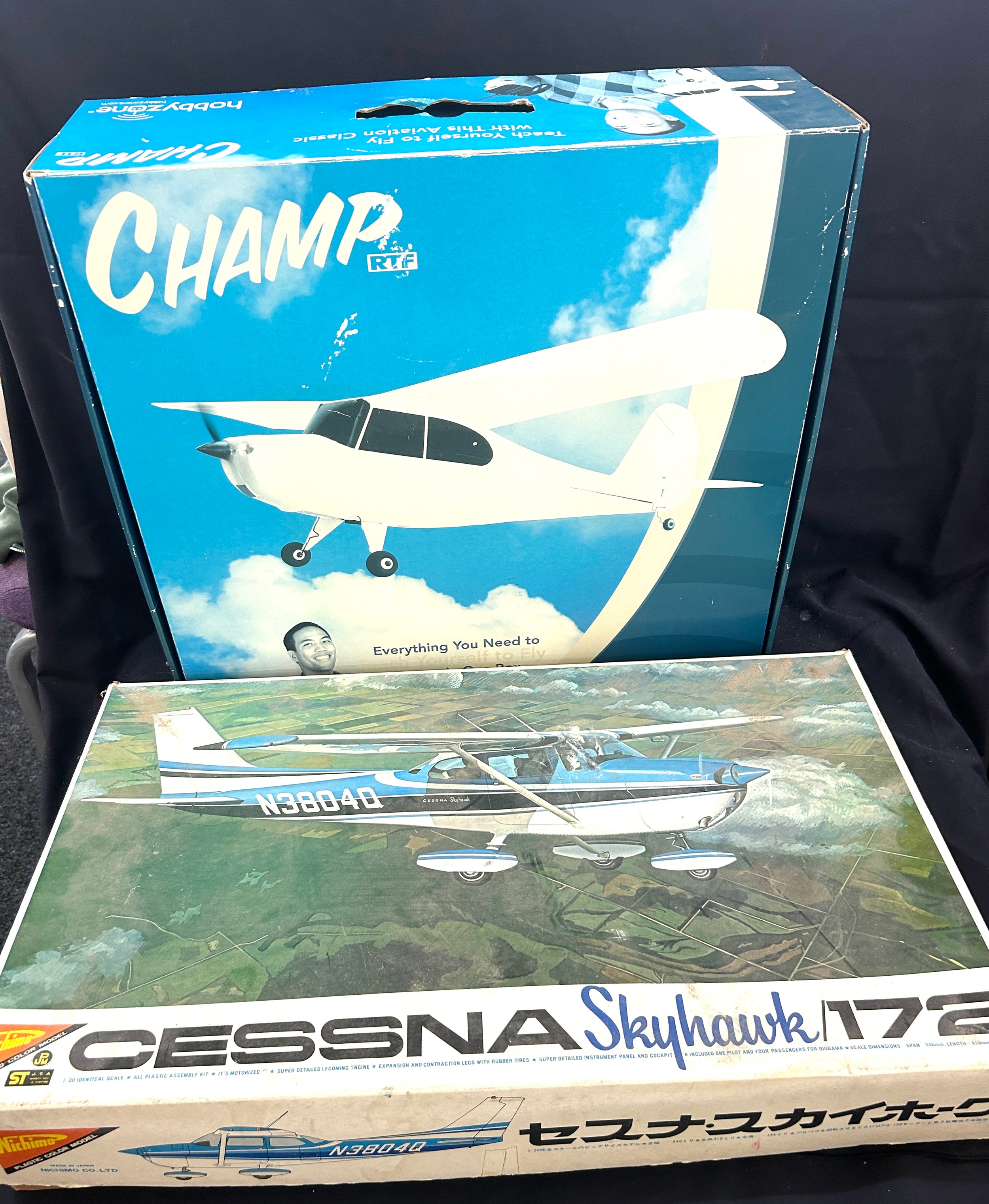 Selection of 2 boxed project model planes includes Champ etc missing parts