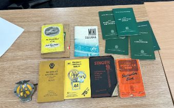 Collection of car manuals + 1957/8 AA badge