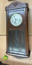 Walnut Edwardian wall clock overall length 32 inches