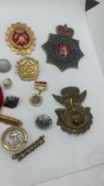 Large selection of assorted pin badges