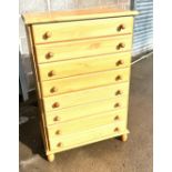 Pine 8 drawer chest measures approx 29 inches wide by 18 inches deep and 44 inches tall