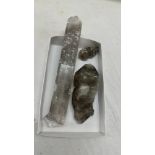 Three old crystals largest measures approximately 12 inches