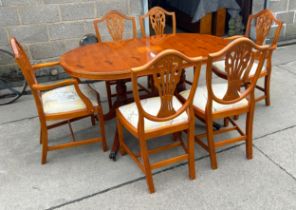 Yew wood extending table and 6 chairs good condition measures approx when shut 60 inches long, 36